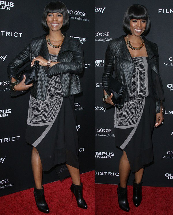 Tasha Smith adds edge to her patterned black dress with a sleek leather jacket and black Christian Louboutin ankle booties at the Los Angeles premiere of Olympus Has Fallen