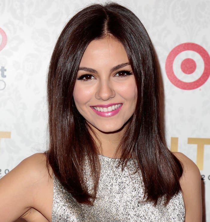 In the spotlight, Victoria Justice shines in a sparkling 'Lora' dress by Alice + Olivia, complemented by subtle, elegant accessories