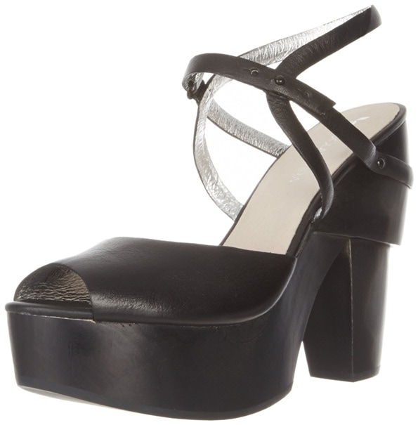 Rendered in versatile black leather, the "Starla" clog offers a slightly more polished take on the silhouette, combining a dramatic platform sole with wraparound ankle straps that balance height, stability, and everyday wearability