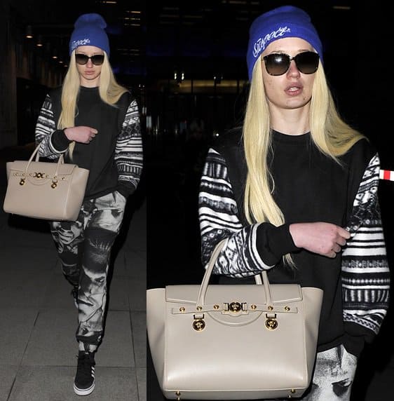 Iggy Azalea steps out in London with a chic Versace handbag, adding elegance to her hip hop style