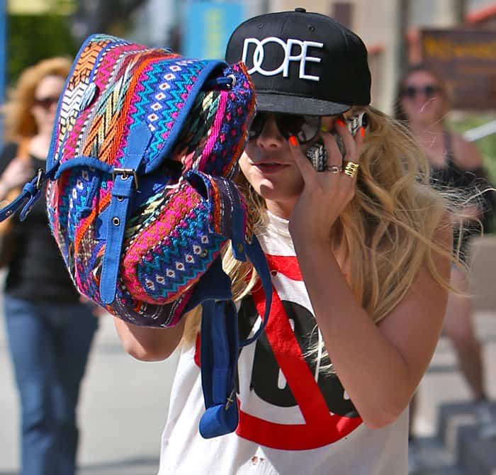 Ashley Benson stylishly sports an ikat-printed Ecote backpack while out in Los Angeles