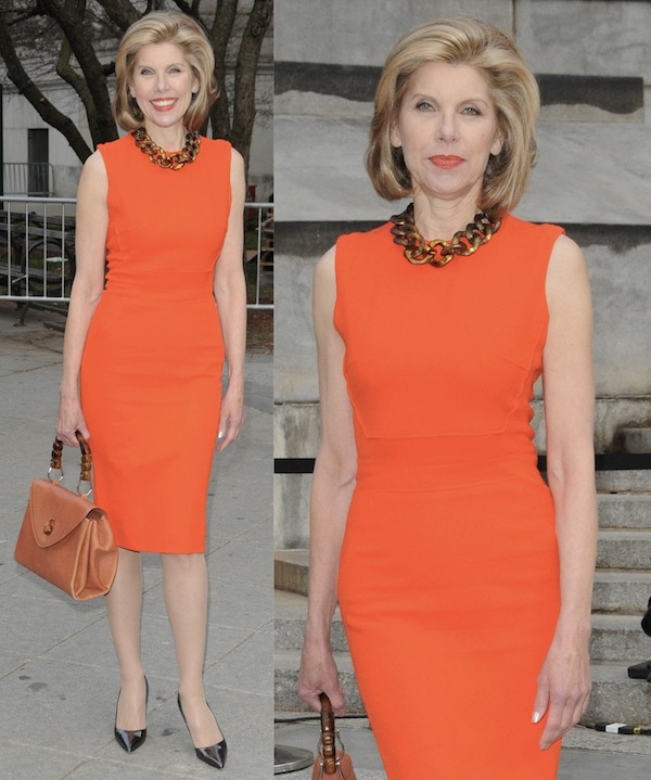 Christine Baranski attends Vanity Fair’s Tribeca Film Festival kick-off party in New York City on April 17, 2013, wearing a sleeveless orange sheath dress styled with metallic black patent Manolo Blahnik ‘BB’ pumps, a sculptural chain necklace, and a structured top-handle handbag