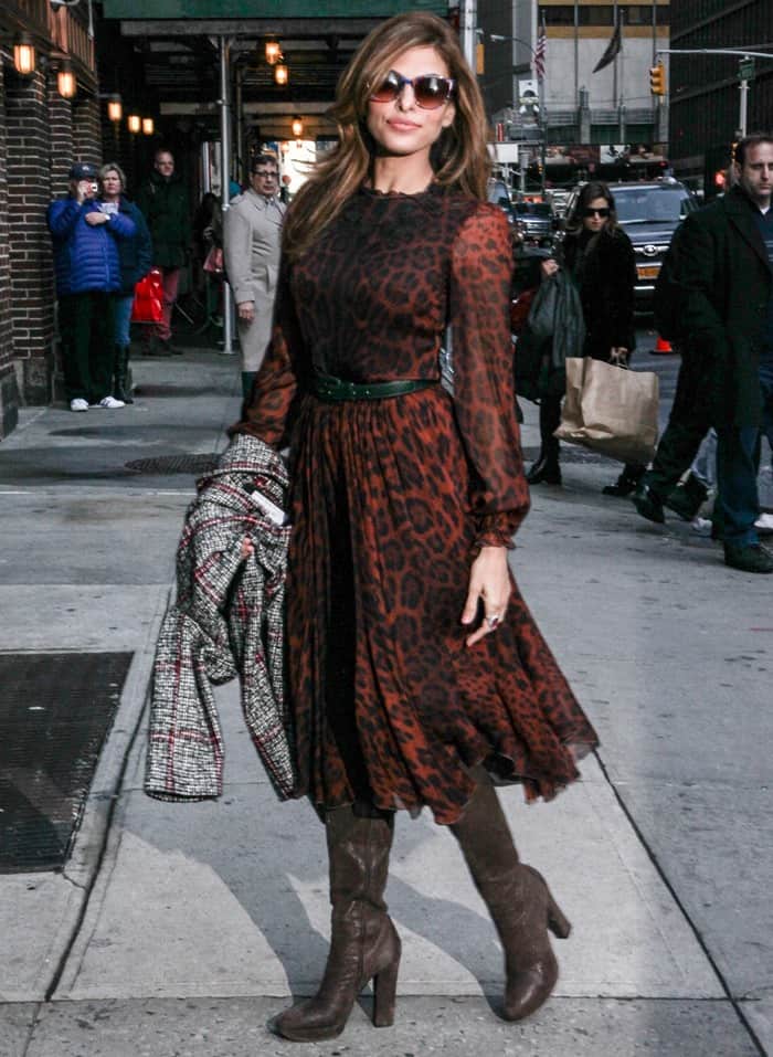 Eva Mendes in a sultry Dolce Gabbana animal-print long-sleeved dress featuring an intricately embroidered neckline that was perfectly accentuated by a stylish green leather belt outside the Ed Sullivan Theatre for her appearance on the Late Show with David Letterman