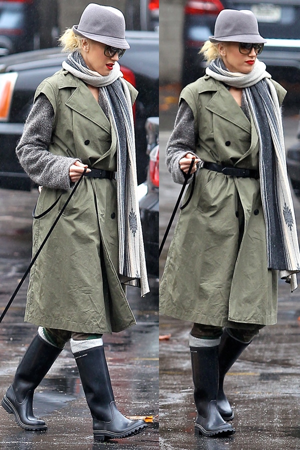 Gwen Stefani steps out with her new puppy in Sherman Oaks on November 29, 2012, braving the rain in sleek black knee-high rain boots paired with an olive trench coat, gray scarf, and fedora for effortless wet-weather style
