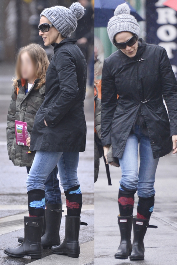 Sarah Jessica Parker keeps rainy-day school drop-off chic in the West Village on March 12, 2013, pairing black Hunter Original Short Wellies with colorful knee socks, skinny jeans, a fitted black jacket, and oversized sunglasses for a polished yet practical look
