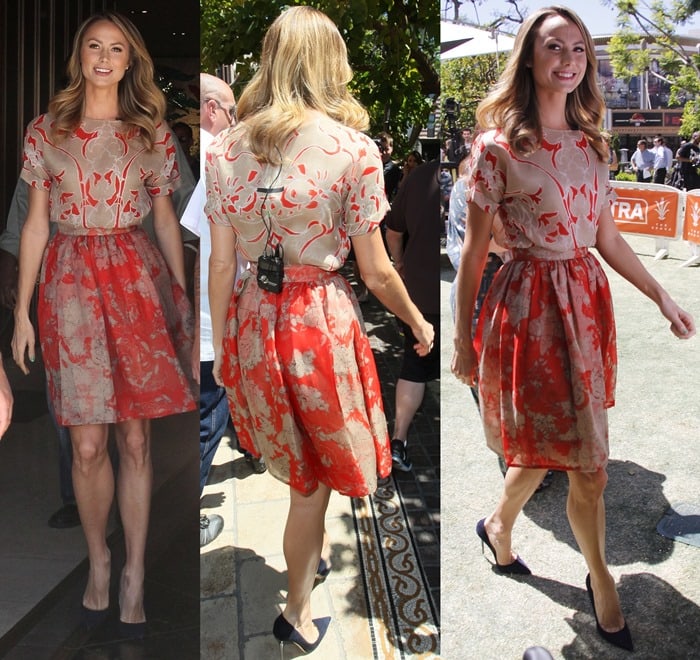 Stacy Keibler showcased her long legs in a red-and-tan floral Wes Gordon dress paired with navy suede Jimmy Choo “Anouk” pumps, adding height and elegance to her feminine look