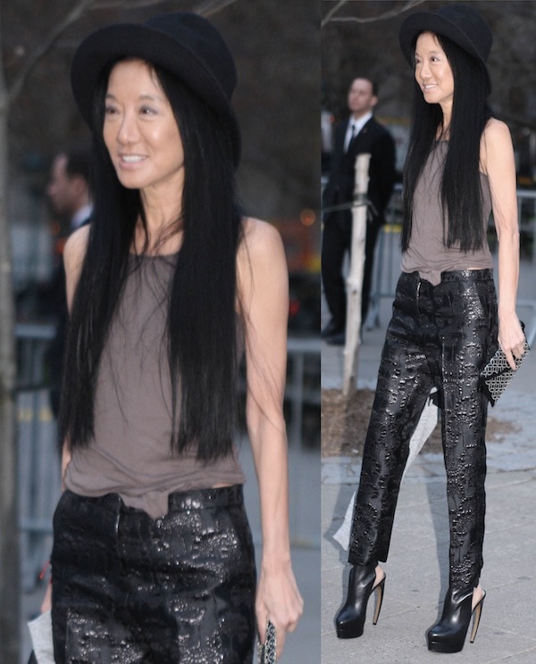 Vera Wang attends Vanity Fair’s Tribeca Film Festival kick-off party in New York City on April 17, 2013, wearing a sleeveless taupe top styled with textured black trousers, a black brimmed hat, and black platform ankle booties, finished with a chain-strap clutch