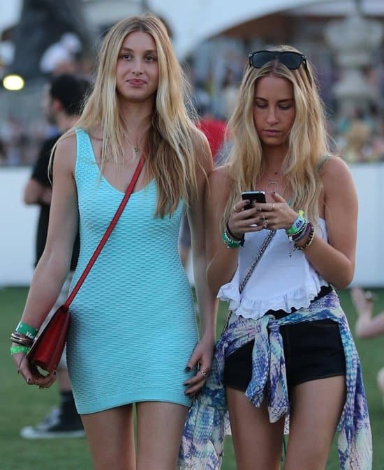 Whitney Port attended the Coachella Music Arts Festival on April 12, 2013, in a blue Whitney Eve cutout seamless dress
