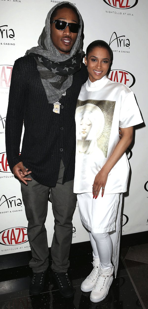 Ciara and Future arrive at Haze Nightclub at the Aria Resort and Casino in Las Vegas on March 28, 2013, coordinating in runway-inspired Givenchy looks, with Ciara grounding her androgynous ensemble in white high-top sneakers