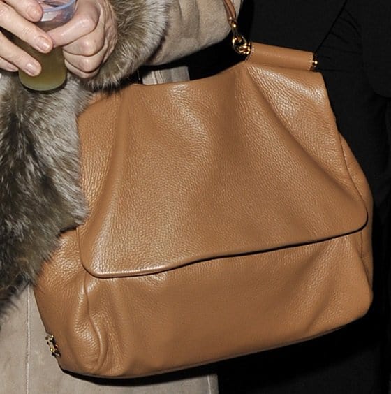 Close-up of Dame Helen Mirren's cherished beige Miss Sicily bag by Dolce Gabbana