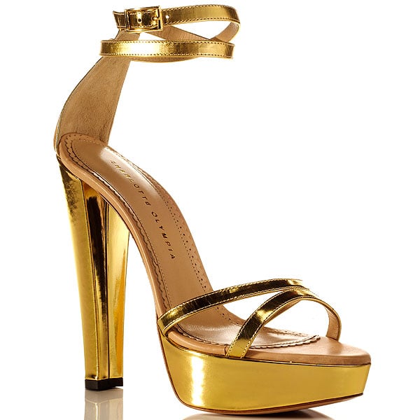 Julianne Moore’s red-carpet heels were the Charlotte Olympia Tokyo platform sandals, featuring a towering metallic platform and a notoriously narrow toe box