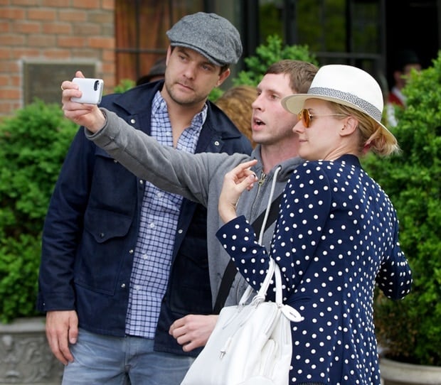 Diane Kruger seen posing with Joshua Jackson and a fan in the East Village