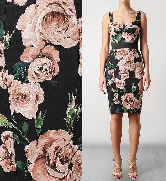 This sexy Dolce Gabbana bustier dress features a lush floral print that gives a nod to traditional sofa upholstery