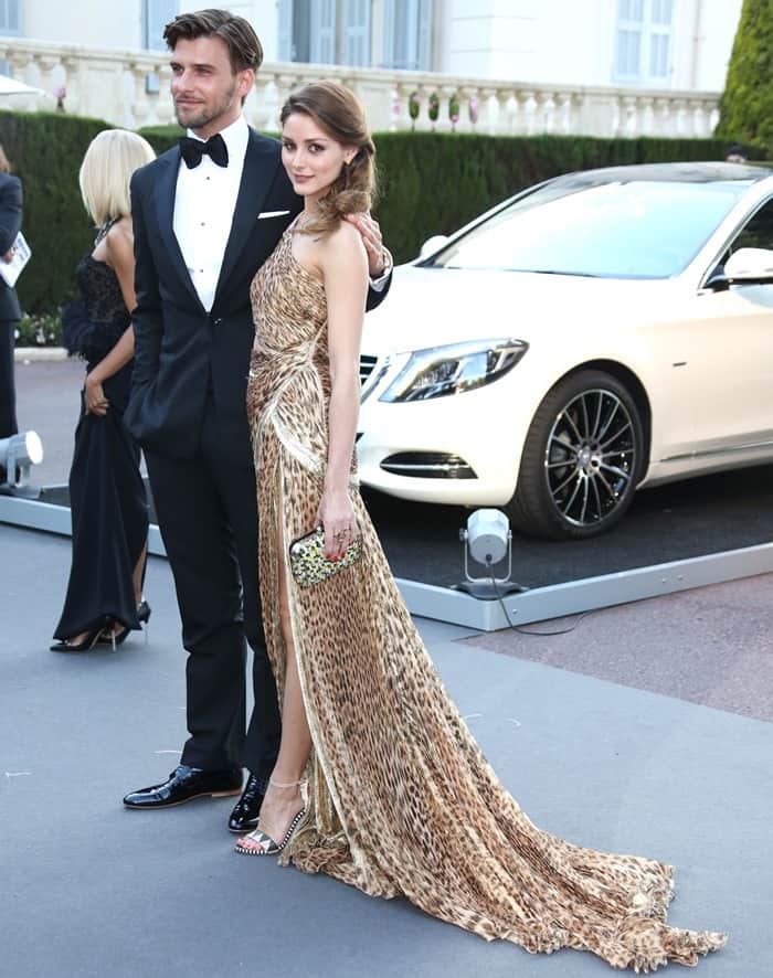Johannes Huebl and Olivia Palermo pose elegantly at the 20th amfAR Cinema Against AIDS gala during Cannes Film Festival, 2013