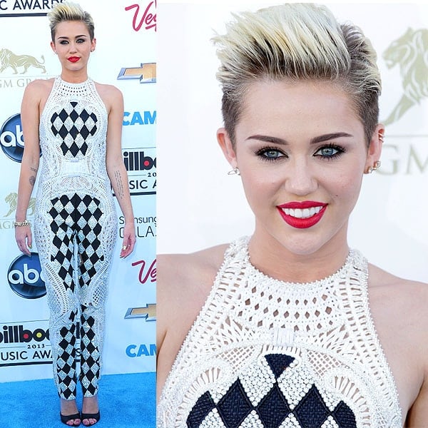 Miley Cyrus makes a bold statement in a chic Balmain jumpsuit paired with edgy Givenchy Shark-Lock sandals at the Billboard Music Awards