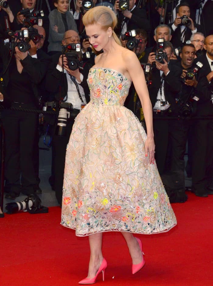 Nicole Kidman stuns in a strapless tea-length gown adorned with intricate floral embroidery in pastel hues at the opening ceremony of the 66th Cannes Film Festival