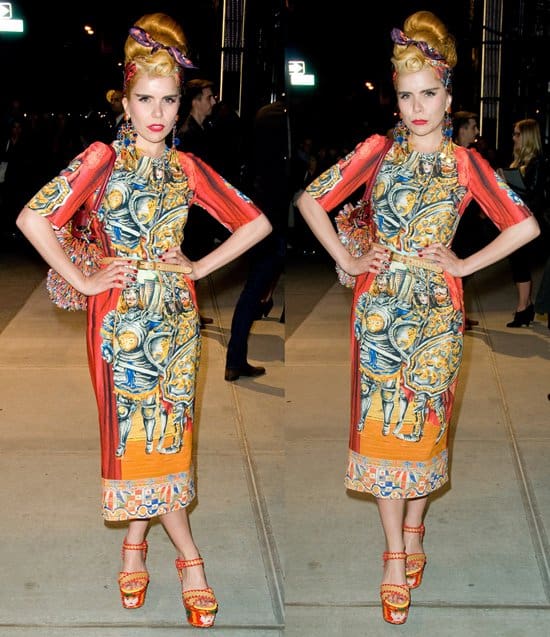 Paloma Faith captivates in Dolce Gabbana’s Spring 2013 Ready-to-Wear Knights dress, an orange midi dress adorned with medieval imagery, at their Fifth Avenue opening
