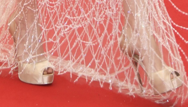 Paz Vega wearing Ferragamo champagne satin pumps