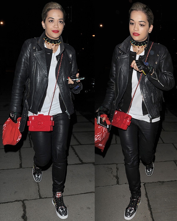 Rita Ora steps out in London in April 2013 wearing a black-and-white androgynous look anchored by leather separates and her bold printed Christian Louboutin “Rantus Orlato” sneakers