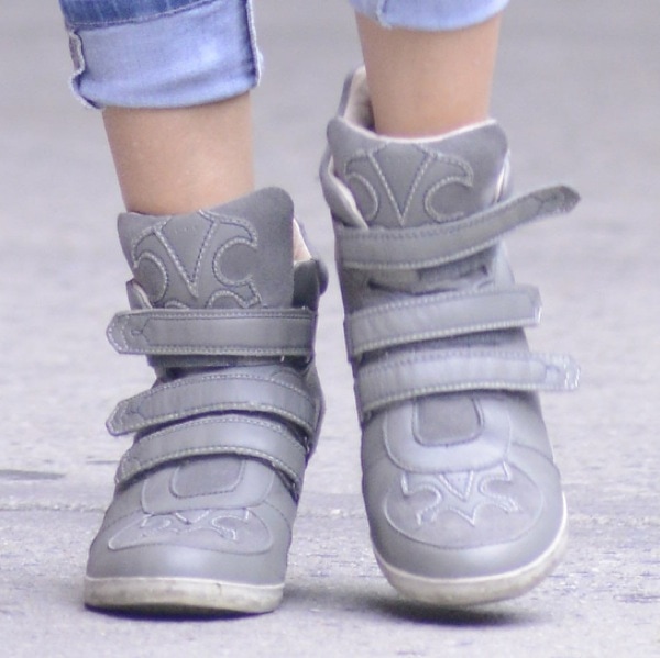 Sarah Jessica Parker wearing gray wedge sneakers from Koolaburra
