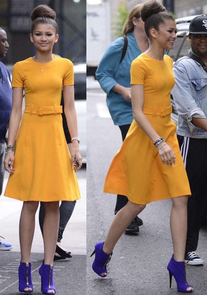 Zendaya stuns in a vibrant marigold Prada dress paired with bold purple Giuseppe Zanotti peep-toe booties