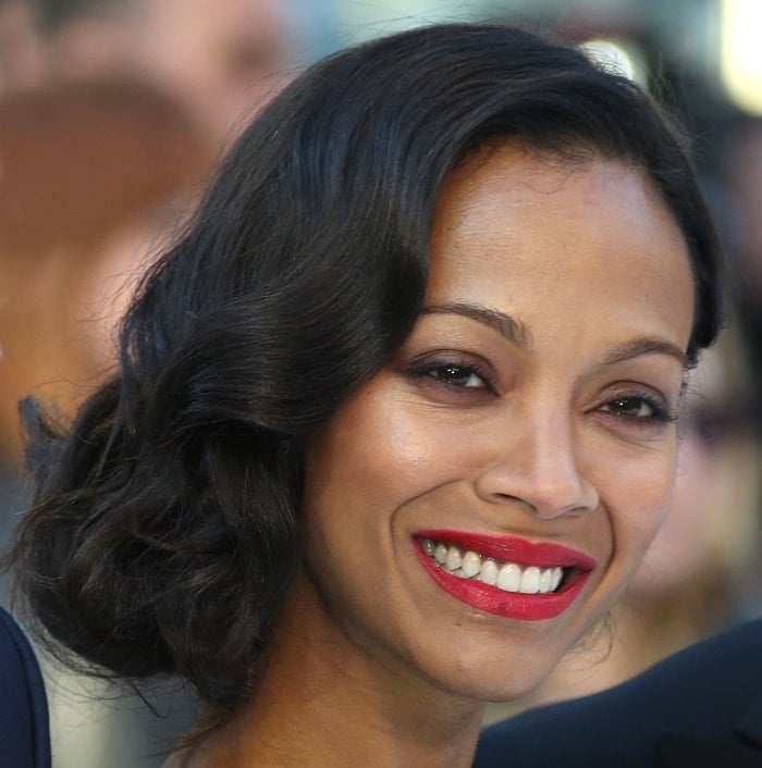 Zoe Saldaña with bright red lipstick
