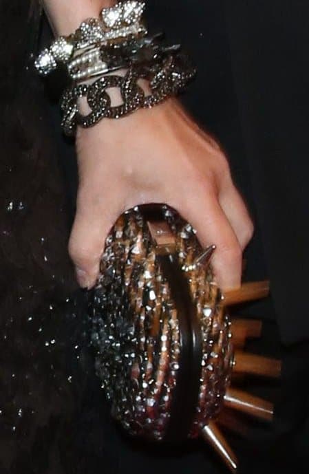 Diane Kruger completed her look with a dramatic, studded and spiked clutch that perfectly captured the event's punk theme
