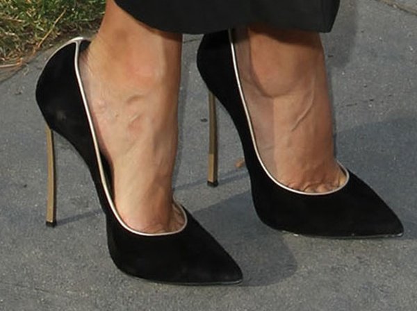 Eva Longoria completes her graduation look with sleek black Casadei pumps