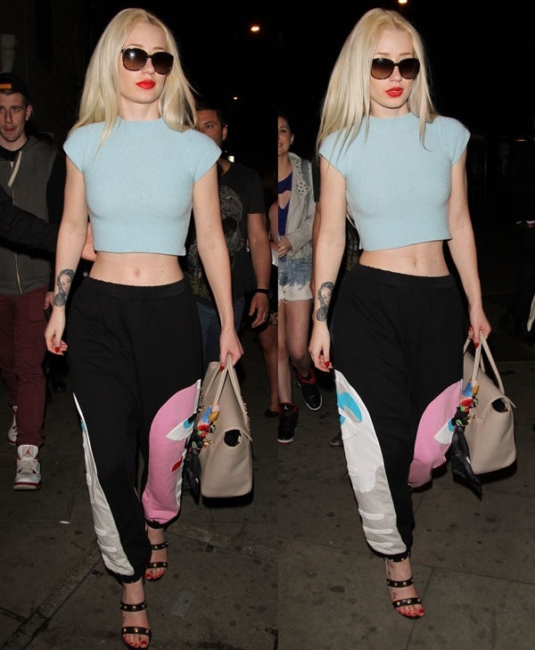 Iggy Azalea turns heads outside the Angel Haze Gypsy Militia UK Tour concert in London on May 7, 2013, pairing graphic sweatpants and a cropped aqua knit top with studded Versace medallion sandals for an unexpectedly bold late-night look