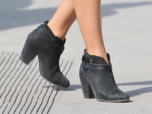 Close-up of Julianne Hough's stylish Rag Bone 'Harrow' ankle boots, a perfect match for her denim dress