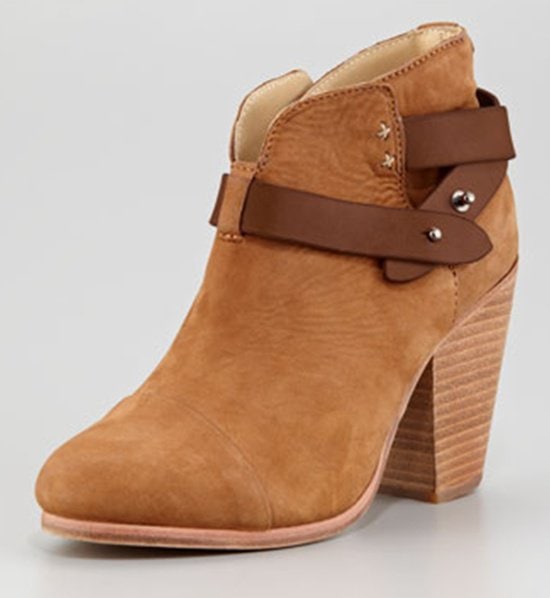 Rag Bone's Harrow ankle boot in Camel showcases the design's signature moto-inspired ankle strap, notched topline, and stacked wooden heel—a combination that helped make it one of the brand's most enduring off-duty staples.