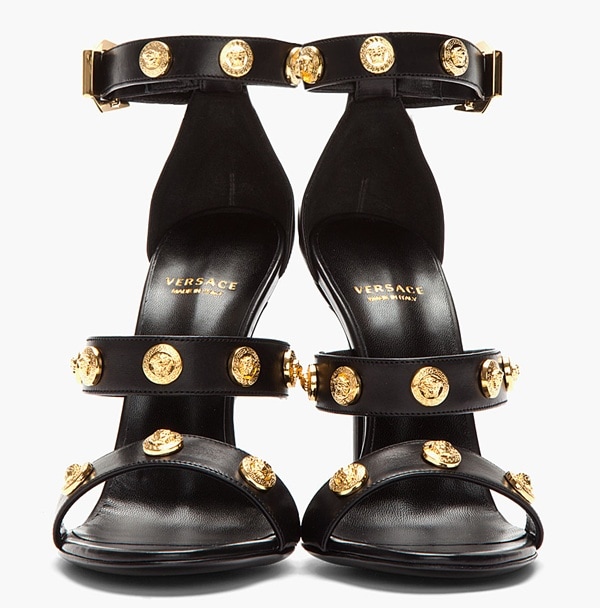 Versace Black Leather Gold Medallion Sandals featuring triple straps embellished with the brand’s iconic Medusa studs