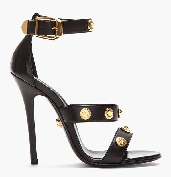 Black Leather Versace Sandals accented with the house’s iconic gold Medusa medallions and slim stiletto heel