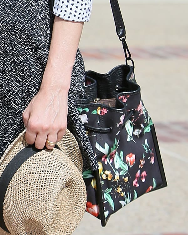 Diane Kruger stylishly departs Joel Silver's Memorial Day Party in Malibu, clutching a 3.1 Phillip Lim floral cross-body bag, showcasing her casual yet chic fashion sense