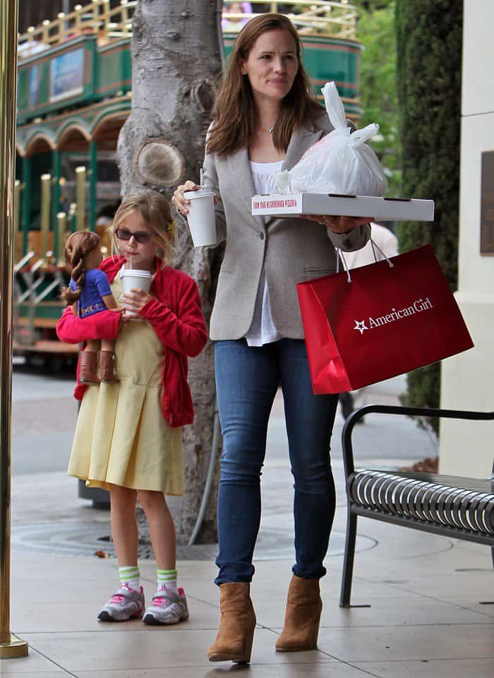Jennifer Garner keeps her look practical yet polished in a beige blazer, white top, and skinny jeans, grounding the outfit with caramel Rag Bone Newbury ankle booties while shopping with daughter Violet Affleck at The Grove in Los Angeles on June 4, 2013