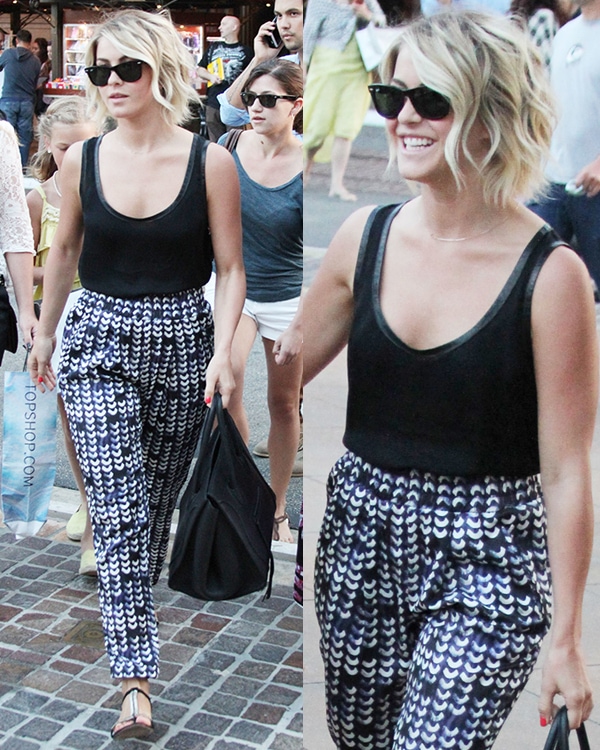 Julianne Hough was spotted leaving the movies at the Grove, stylishly dressed in Ray-Ban Original Wayfarer sunglasses, a Celine Boston Bag Luggage Phantom tote in black natural calfskin, Rag Bone Rani Arrow Print drop waist pants, and Vince Camuto VC Signature Tonya sandals in black