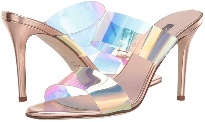 Set atop a slinky stiletto heel, these metallic Fling mules from Sarah Jessica Parker have iridescent PVC and vinyl top straps