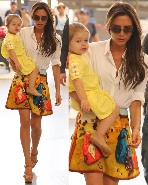Victoria Beckham arriving at LAX with her daughter Harper Seven on June 1, 2013, exuding effortless style in a Carven Fall 2012 printed miniskirt paired with a crisp white button-down and tan Chloe wedge sandals, creating a chic yet playful summer look