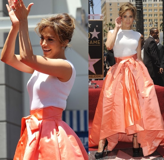 Jennifer Lopez Walk of Fame Brian Atwood Pumps Jennifer Lopez celebrates her Hollywood Walk of Fame milestone in a crisp white Dior top paired with a dramatic peach balloon skirt, finishing the look with black satin Brian Atwood ankle-strap pumps