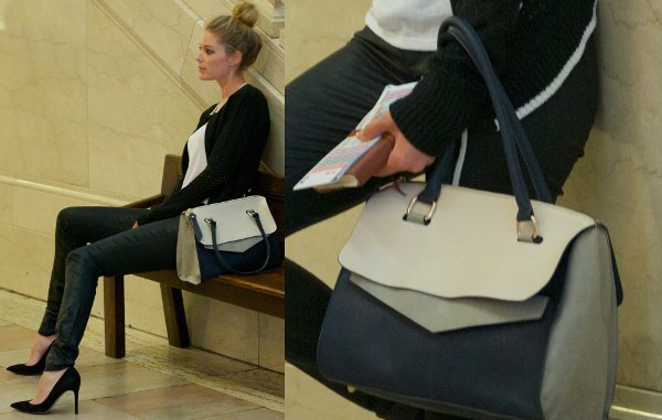 Spotlight on style: Doutzen Kroes features a chic, functional color-block handbag, perfect for urban settings, at her latest Victoria's Secret shoot
