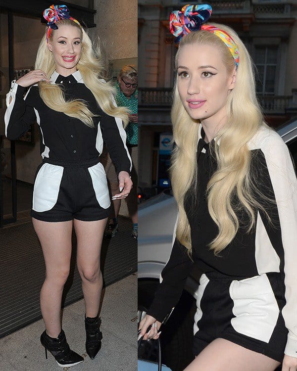 Iggy Azalea styled her long blonde hair in soft waves, topped with a colorful, floral-patterned headscarf tied in a bold knot