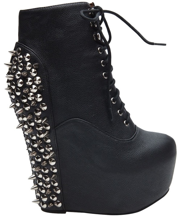 Jeffrey Campbell "Damsel Spike" boots featured an extreme platform wedge silhouette with lace-up detailing and rows of metallic cone studs cascading down the back of the heel, making them one of the brand's most attention-grabbing statement shoes of the early 2010s