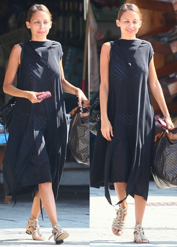 Nicole Richie keeps it casual in a flowy black dress paired with studded gladiator sandals