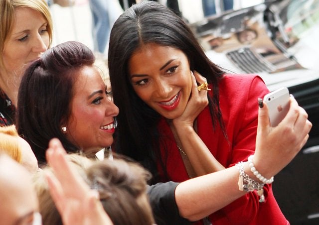 Nicole Scherzinger sharing a moment with fans at The X Factor audition in Cardiff