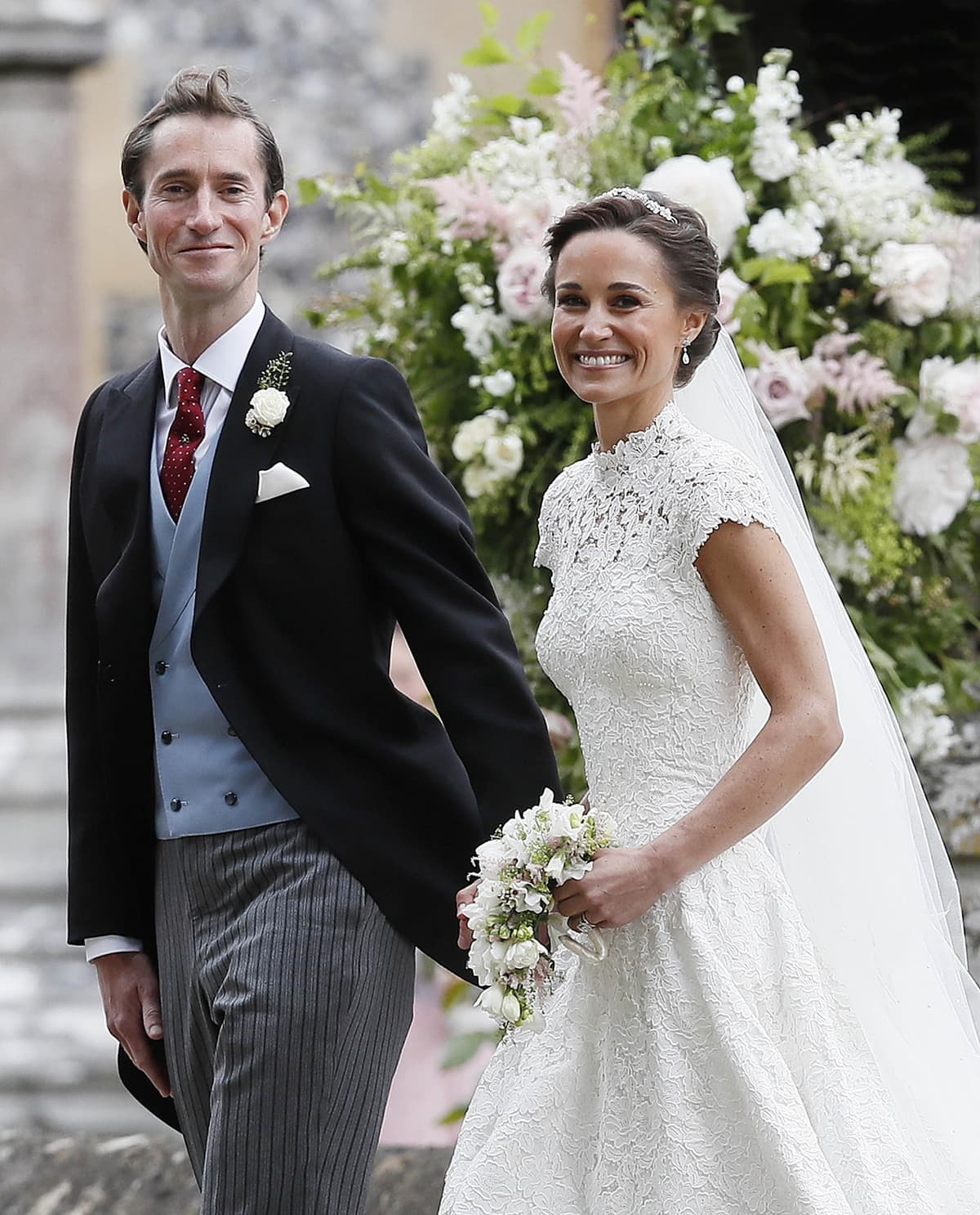 Pippa Middleton married James Matthews in a custom Giles Deacon wedding gown and a bespoke veil by Stephen Jones