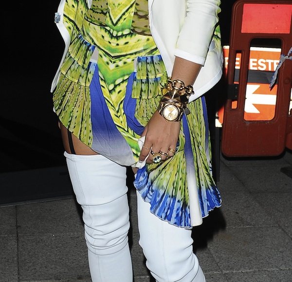 Rita Ora reveals chic thigh garters complementing her club outfit, July 26, 2013