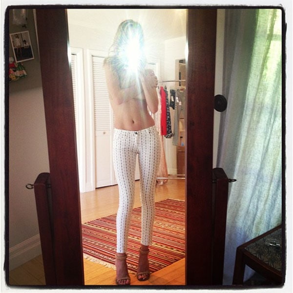 From Rosie's Instagram: Captured in her beloved @chercoulter jeans for @agjeans, she shares a moment of her day-to-day chic