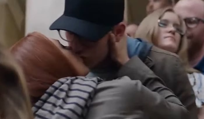 There's a surprising kiss between Scarlett Johansson's Black Widow and Chris Evans' Captain America in The Winter Soldier, with Natasha disguising them as a couple to evade surveillance—complete with her nautical-striped hoodie and his baseball cap and glasses for incognito flair