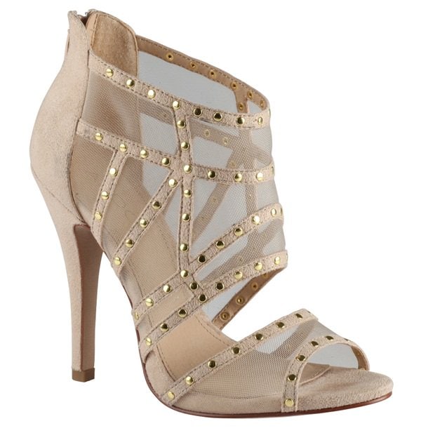 Rendered in a softer neutral tone, the bone-colored version highlights the intricate strapwork and mesh construction, offering a lighter, more versatile take on the same statement silhouette