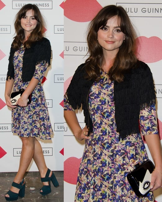Jenny Louise Coleman combines a colorful floral dress and black fringe bolero with teal platform heels, finishing her playful look with Lulu Guinness’s whimsical 'Doll Face Fifi' clutch